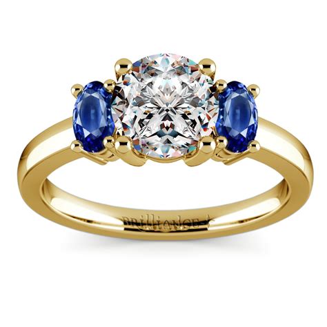Oval Sapphire Gemstone Engagement Ring In Yellow Gold
