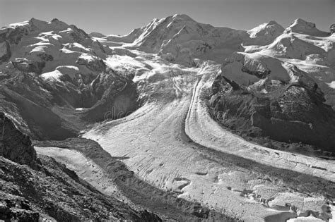 Swiss Alps Panoramic View To The Dufourspitze And Melting Grenzglacier