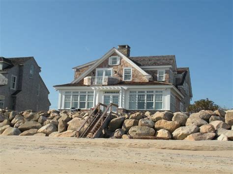 It is located on west beach set back just beyond the dunes and sea grass where it has direct gulf views from the balconies. New England beach house | Beach cottage style, Beach house ...