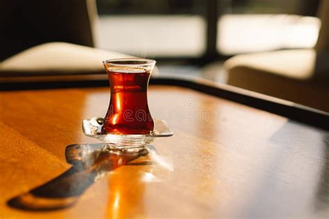 Turkish Tea Served In Tulip Shaped Glass On Rustic Table Turkish Tea