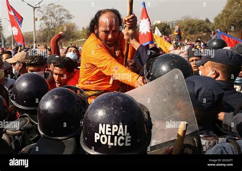 Kathmandu Bagmati Nepal 11th Jan 2021 A Pro Monarchy Protester Scuffles With Riot Police As