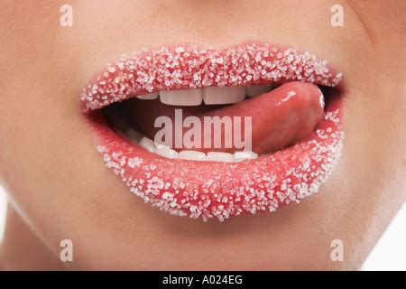 Tongue Licking Lips Covered In Sprinkles Stock Photo Alamy