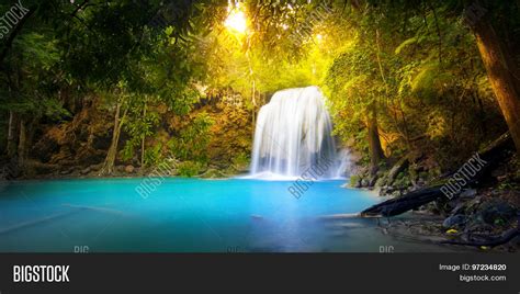 Exotic Background Of Beautiful Jungle Forest With Majestic Waterfall