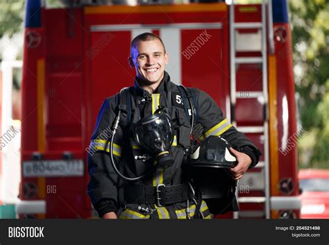 Photo Happy Fireman Image And Photo Free Trial Bigstock