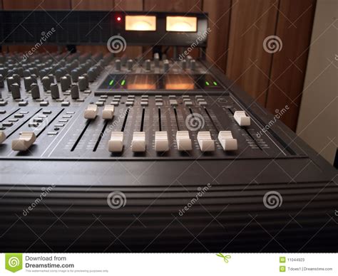 We master for itunes, spotify, websites, radio, tv, music videos, and every other playback sound system you can think of. Studio Mixing Board Stock Photos - Image: 11044923