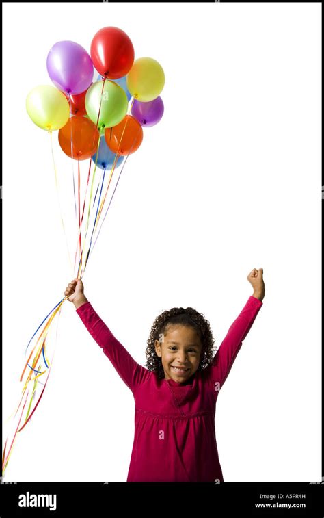 Young Girl Holding Balloons Stock Photo Alamy