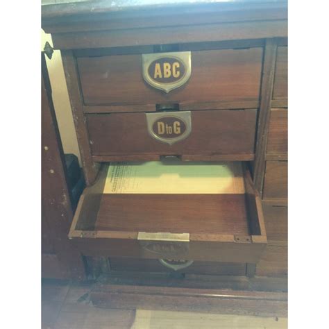 A caster base for mobility and a leveler base to adjust the height are both. Cameron Amberg & Co Patent Letter File Cabinet | Chairish