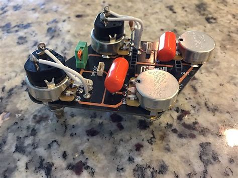 Two pickups, each with a volume and tone control. Gibson USA Les Paul Guitar Quick Connect PCB Control Board | Reverb