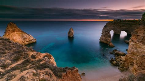 Algarve Coast Landscape Portugal Rock And Ocean During