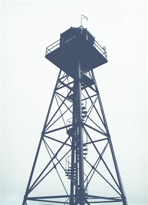 A Prison Guard Watchtower In Alcatraz Island Watch Tower Gray Sky 4k