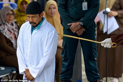 Two Men Are Publicly Flogged In Indonesia Under Sharia Law After Being