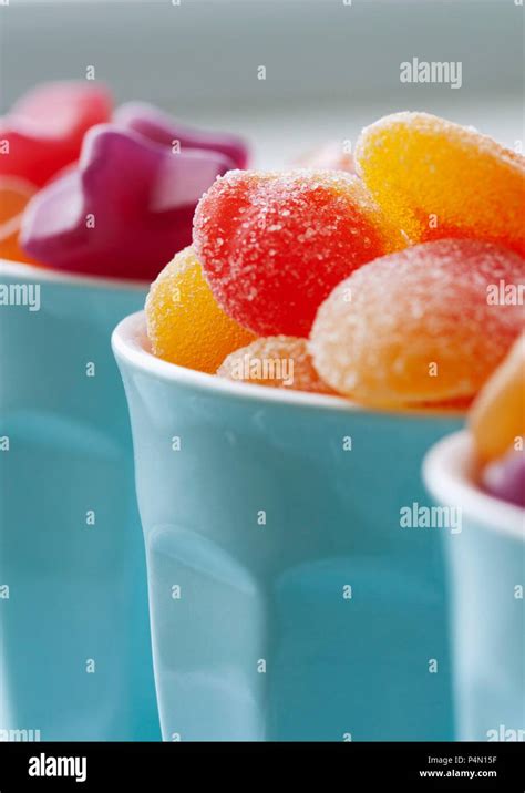 Colourful Jelly Sweets In Blue Cups Stock Photo Alamy