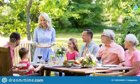 The dinner party from hell: Happy Family Having Dinner Or Summer Garden Party Stock ...