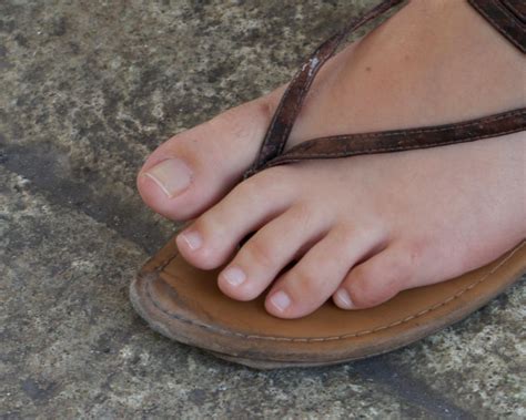 sue s unpolished toes in flip flops by feetatjoes on deviantart