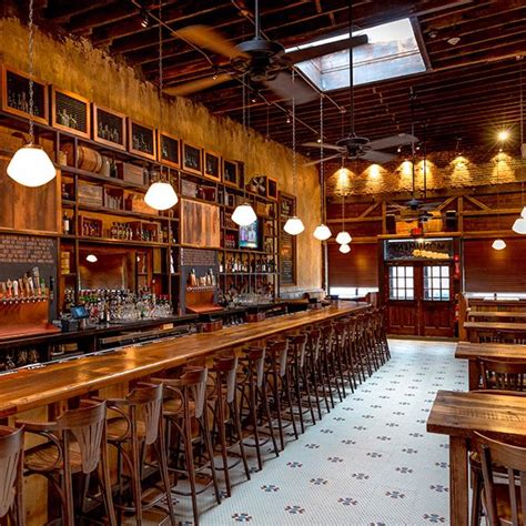 Maybe you would like to learn more about one of these? The long, curving bar in this Charlestown, MA restaurant ...