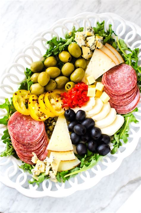 Create a spread to impress with this gourmet antipasto platter. Antipasto Platter | Recipe | Antipasto platter, Antipasto, Healthy appetizers