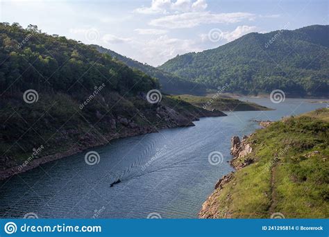 A Large Reservoir Surrounded By Mountains Fertile Forest Beautiful