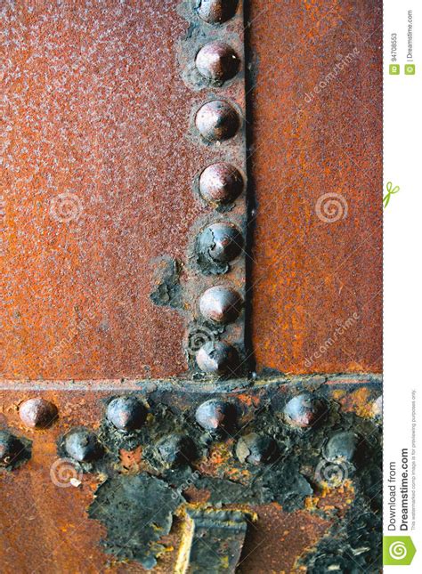 Rusty Rivets Found On Old Metal With A Pitted Texture Stock Image