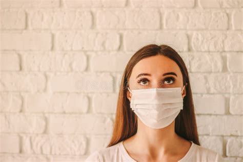 Girl In Medical Face Mask Looking At Copy Space Stock Image Image Of