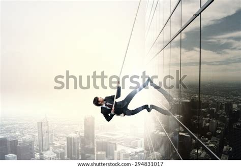 Determined Businessman Climbing Building Help Rope Stock Photo Edit