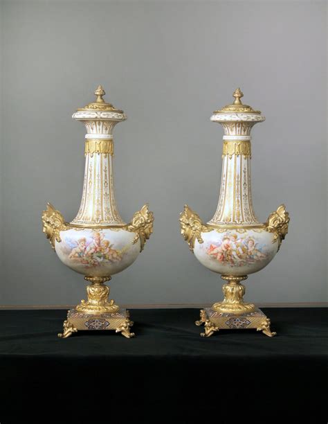 A Beautiful Pair Of Late 19th Century Gilt Bronze And Champlevé Enamel Mounted White Sèvres