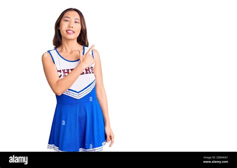 Young Beautiful Chinese Girl Wearing Cheerleader Uniform Cheerful With