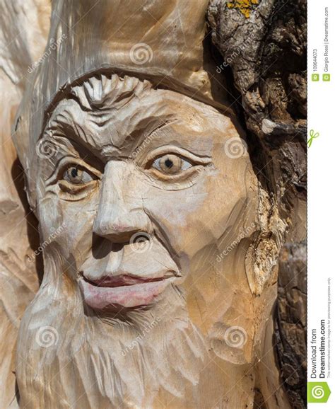 Wooden Tree Sculpture Close Up Of Face Carved In Wood Handmade Stock