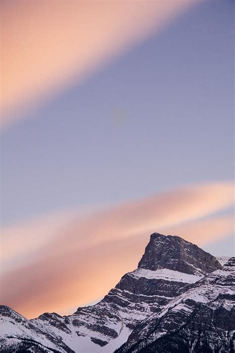 Clouds At Sunset Above Mountain Peaks Photograph By Eryk Jaegermann