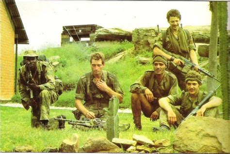 Soldiers From The Rhodesian Security Forces Taking A Break From