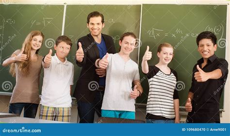 Teacher Motivating Students In School Class Stock Photo Image Of