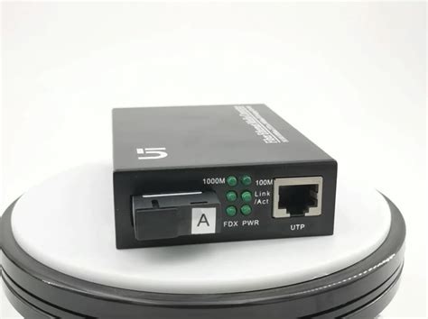 101001000m Gigabit Single Fiber Optic Media Converter 20km 4 Rj45