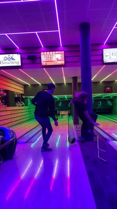 Woman Falls After Guy Accidentally Hits Her Leg With Bowling Ball
