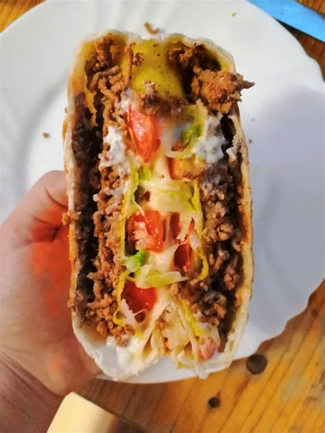 Layers of taco meat, queso, tostada, lettuce, tomato crunchwrap has become a verb in my life. homemade crunchwrap supreme | Homemade crunchwrap ...