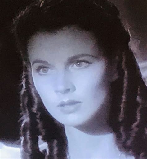 A Woman With Dreadlocks Looking At The Camera