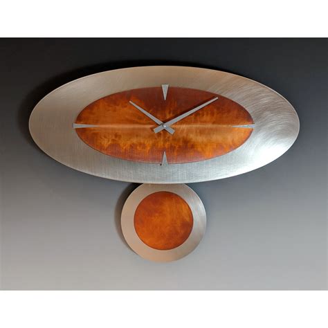 Leonie Lacouette Stand Alone Oval Steel Pendulum Clock Artistic Clocks