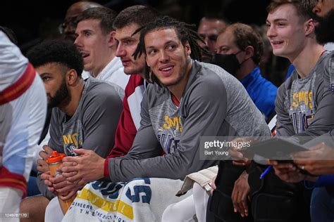 Aaron Gordon Of The Denver Nuggets Sits Courtside During The Game On