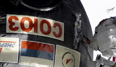 russian cosmonauts take sample of mystery hole in soyuz capsule docked at international space