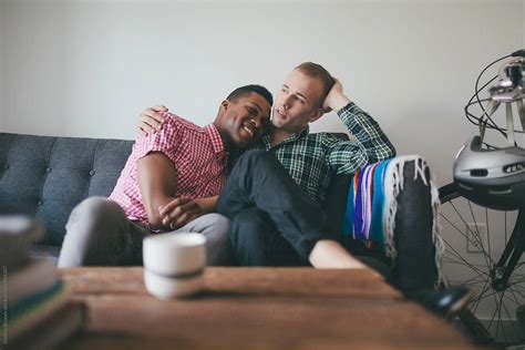 Portrait Of Babe Interracial Gay Couple On A Couch By Stocksy Contributor Joselito Briones