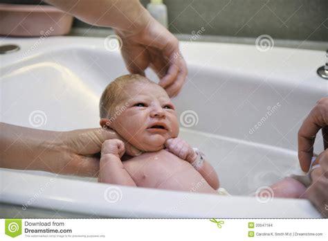 Burt's bees is a favorite brand i use and trust often. Newborn Baby - First Bath stock photo. Image of father ...