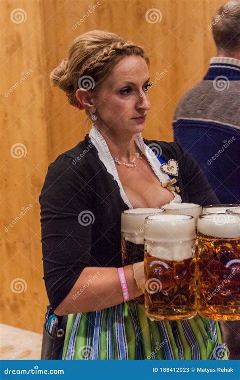 Munich Germany September 17 2016 Waitress Carrying Many Beer Glasses At The Oktoberfest In