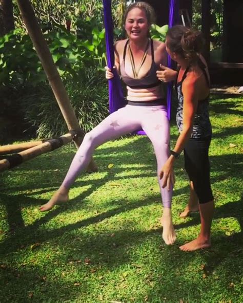 Chrissy Teigen S Boobs Nearly Fall Out Of Skimpy Sports Bra In Eye Popping Yoga Clip Celebrity