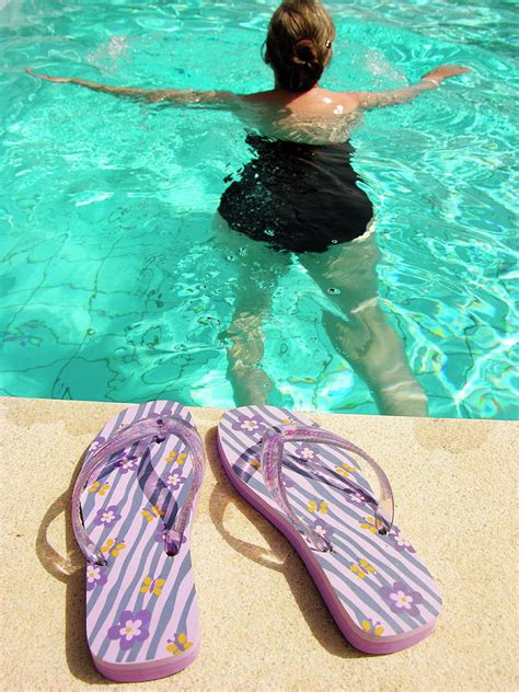 Flip Flops And Woman Swimming In Pool Photograph By Tony Craddockscience Photo Library Pixels