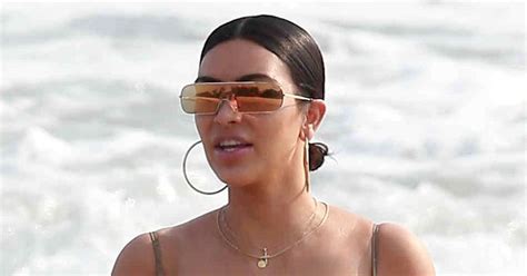 Kim Kardashian Looks Bootylicious In Barely There Bikini While Sister Kourtney Flaunts Underboob