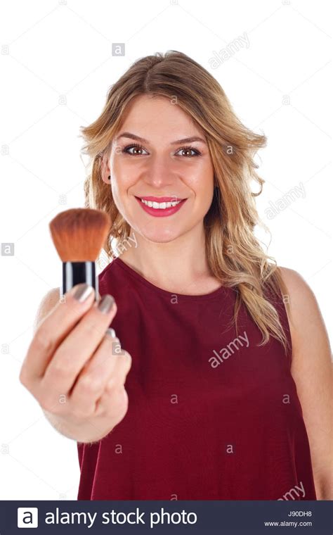 Picture Of A Beautiful Young Lady Holding A Make Up Brush Stock Photo