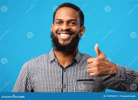 Happy Black Guy Gesturing Thumbs Up And Smiling Stock Photo Image Of