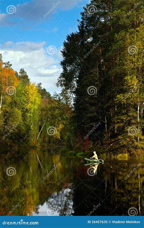 Fisher In Boat Is On The Forest Lake In Autumn Stock Image Image Of