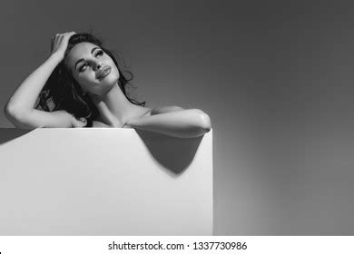 Sexy Naked Brunette Woman Holding Empty Stock Photo