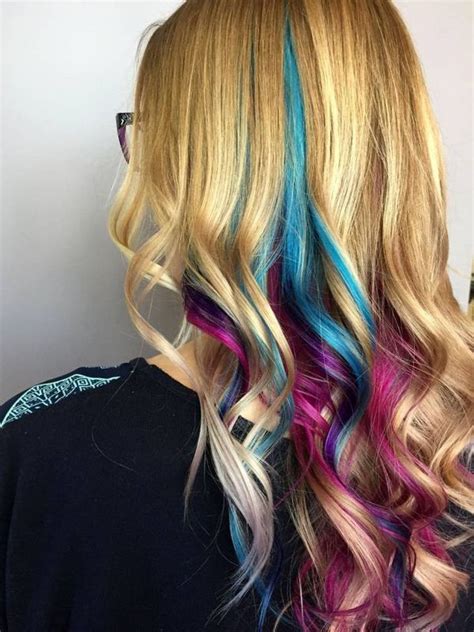 This look contrasts well with blonde hair, but the hue would also pair well with brown hair. 20 Unique and Beautiful Peekaboo Hairstyles - Haircuts ...