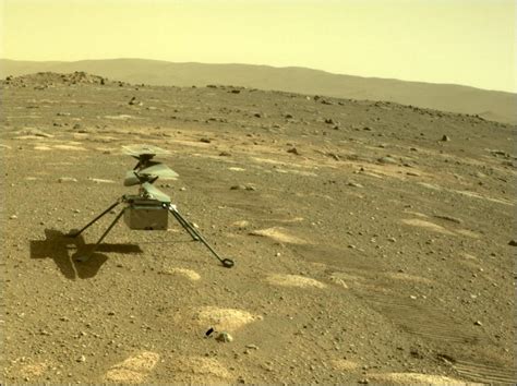 Nasa S Mars Helicopter Ingenuity Took Its First Aerial Color Photos Of The Red Planet S Surface
