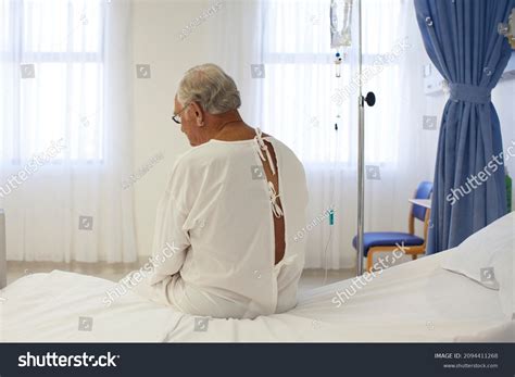 Older Patient Wearing Gown Hospital Room Stock Photo Edit Now